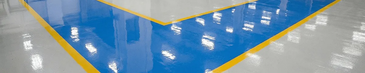 A factory floor professionally covered and marked with epoxy flooring in Fort Worth, TX