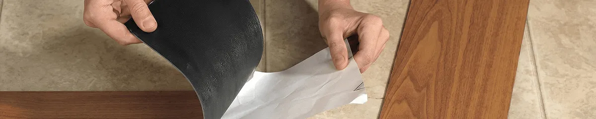 A professional installing vinyl flooring in Fort Worth, TX